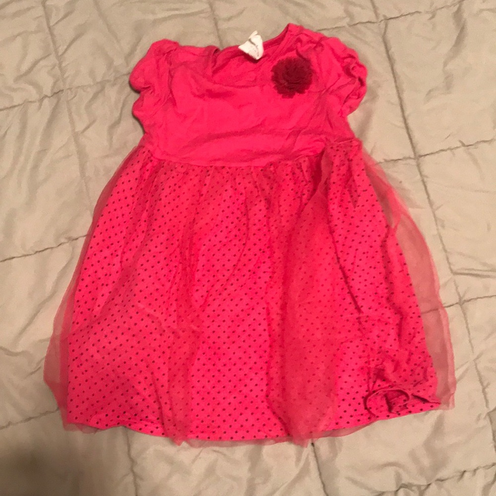 Pink polka dotted dress with tulle